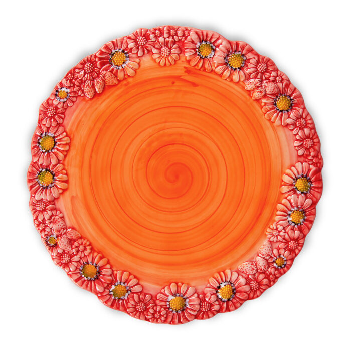 Red plate with daisies